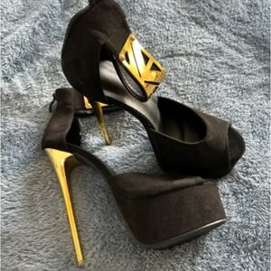 Elegant Black and Gold High Heels